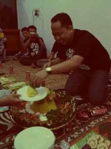 Potong tumpeng